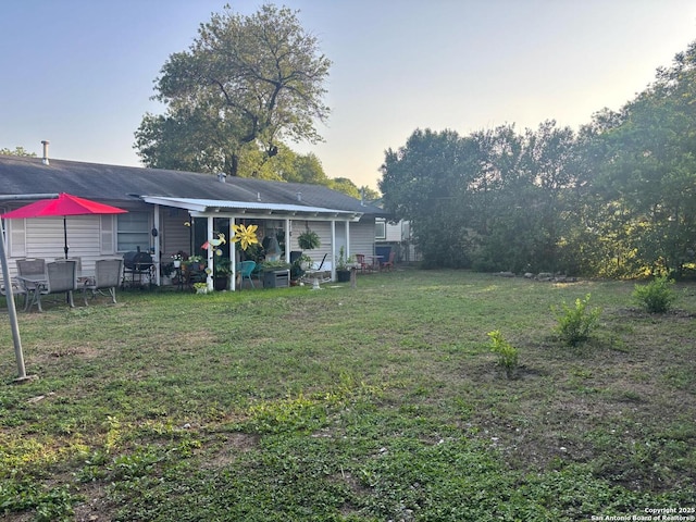 5139 Village Ct, San Antonio, TX 78218 - yard at dusk with a yard