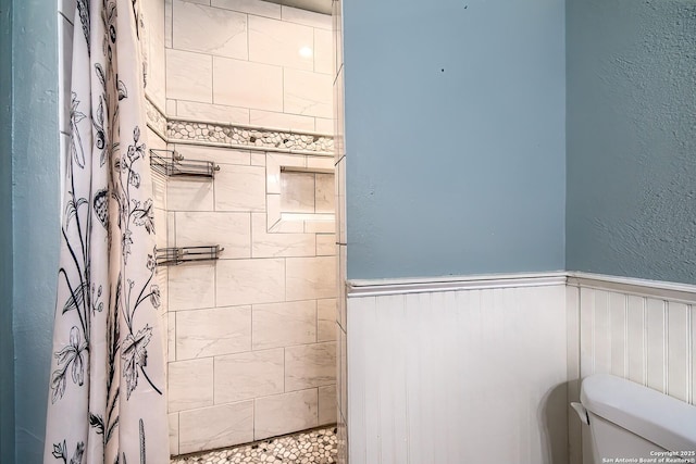 4326 Hilton Head, San Antonio, TX 78217 - full bath featuring wainscoting and a tile shower