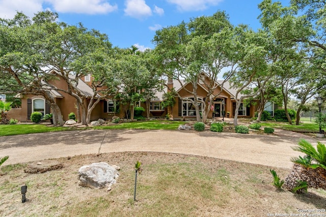5 Remington, San Antonio, TX 78258 - view of front facade with stucco siding