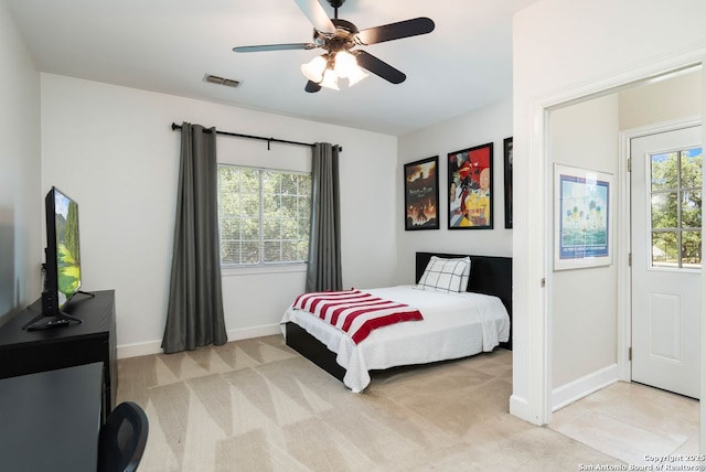 5 Remington, San Antonio, TX 78258 - bedroom featuring multiple windows, light carpet, and ceiling fan