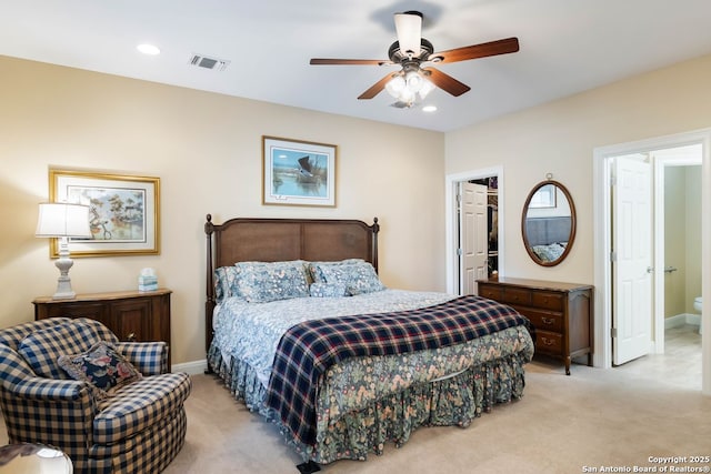 5 Remington, San Antonio, TX 78258 - bedroom featuring light carpet, recessed lighting, a walk in closet, connected bathroom, and a ceiling fan