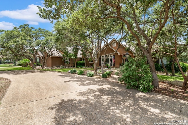 5 Remington, San Antonio, TX 78258 - obstructed view of property featuring stucco siding