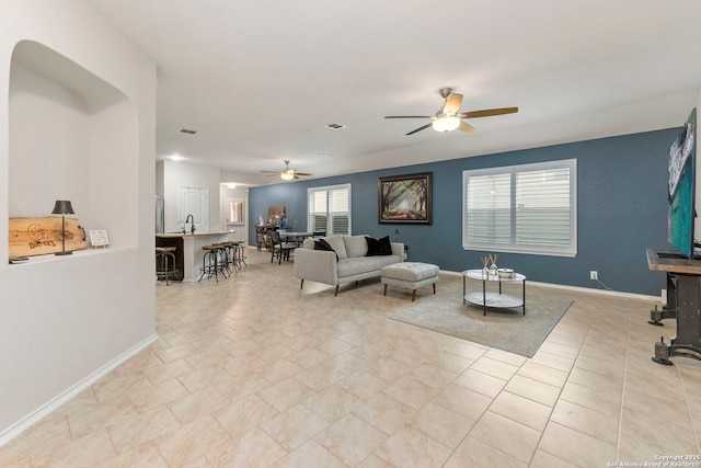 15102 Field Sparrow, San Antonio, TX 78253 - living room featuring ceiling fan and baseboards