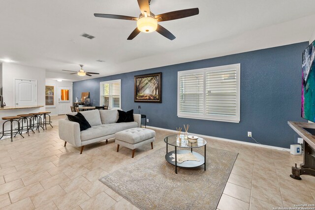 15102 Field Sparrow, San Antonio, TX 78253 - living area featuring ceiling fan and tile patterned flooring