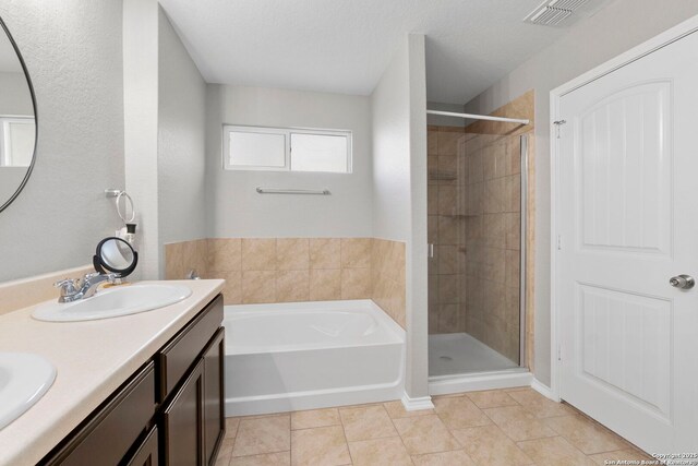 15102 Field Sparrow, San Antonio, TX 78253 - full bathroom featuring a garden tub, a stall shower, and double vanity