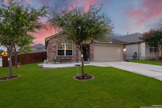 15102 Field Sparrow, San Antonio, TX 78253 - view of front facade with driveway, a garage, and stone siding