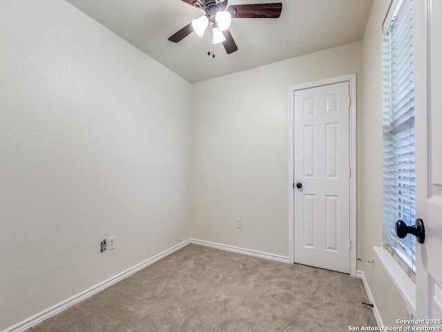 97 Windcrest, Floresville, TX 78114 - carpeted empty room featuring a ceiling fan and baseboards