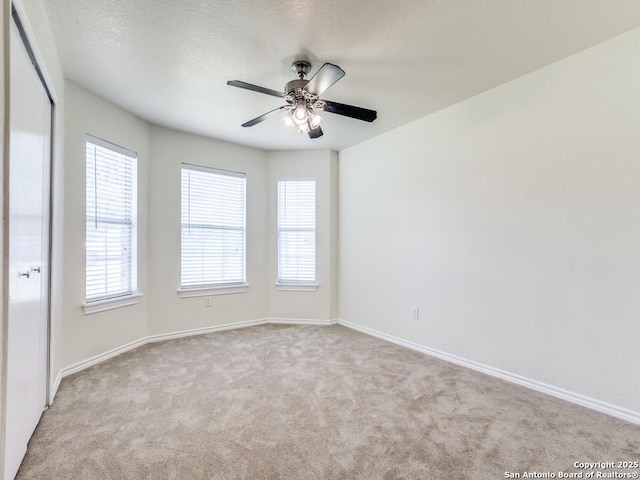 97 Windcrest, Floresville, TX 78114 - spare room with carpet and a ceiling fan