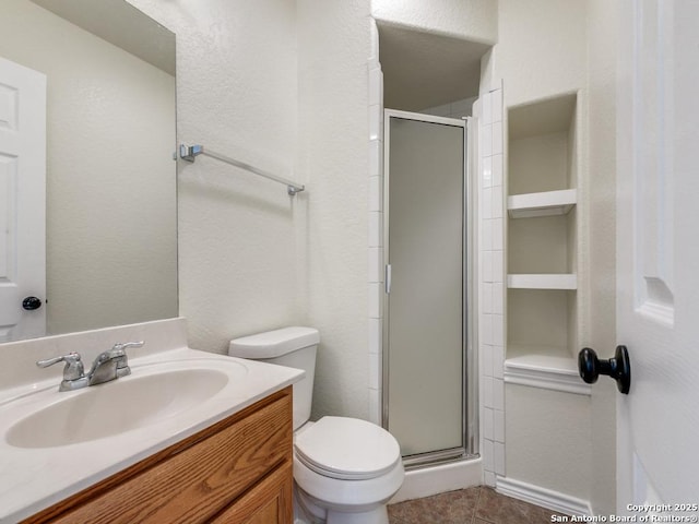 97 Windcrest, Floresville, TX 78114 - bathroom with a stall shower, vanity, and tile patterned flooring