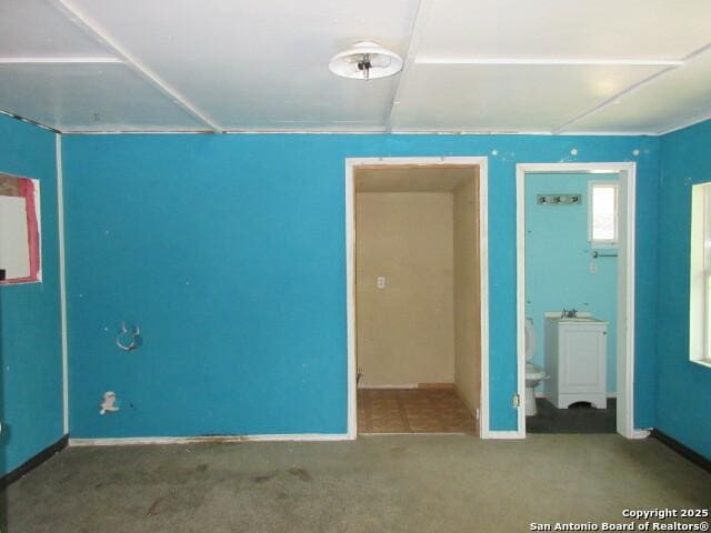 2310 W Gramercy, San Antonio, TX 78201 - unfurnished bedroom with carpet flooring and baseboards