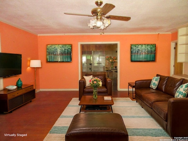 2310 W Gramercy, San Antonio, TX 78201 - living room with ceiling fan, ornamental molding, and wood finished floors