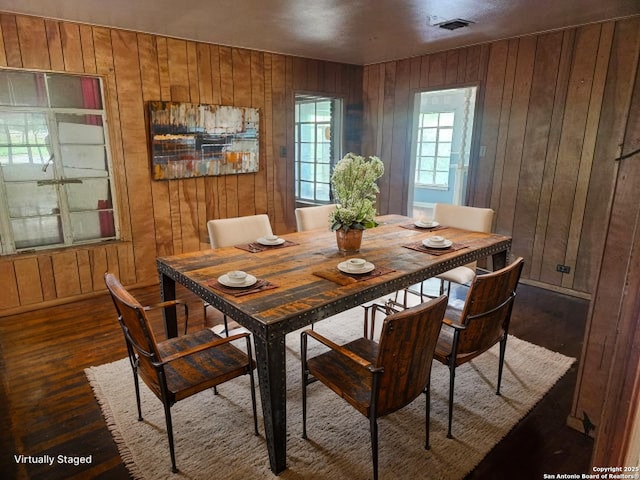 2310 W Gramercy, San Antonio, TX 78201 - dining room with wooden walls and dark wood-type flooring