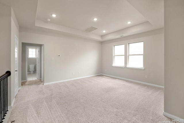 2614 Banditos Rdg, San Antonio, TX 78245 - unfurnished room with a raised ceiling, light carpet, and recessed lighting