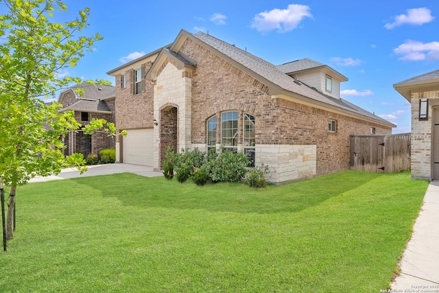 2614 Banditos Rdg, San Antonio, TX 78245 - french country style house featuring a garage, brick siding, driveway, and stone siding