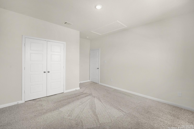2614 Banditos Rdg, San Antonio, TX 78245 - unfurnished bedroom with carpet floors, a closet, recessed lighting, and attic access