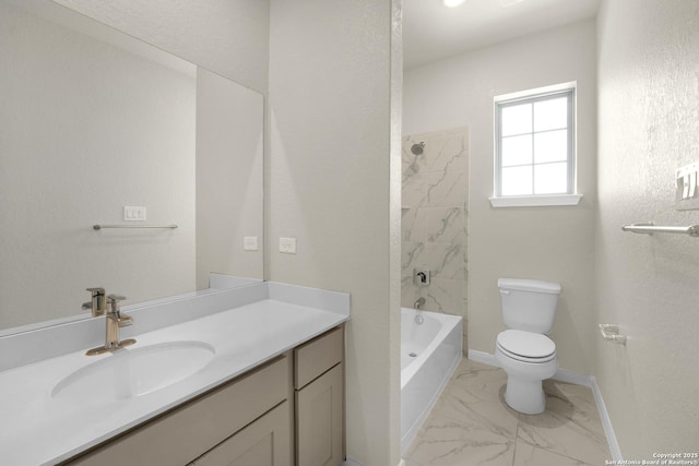 2614 Banditos Rdg, San Antonio, TX 78245 - bathroom featuring vanity, marble look tiles, and bathtub / shower combination