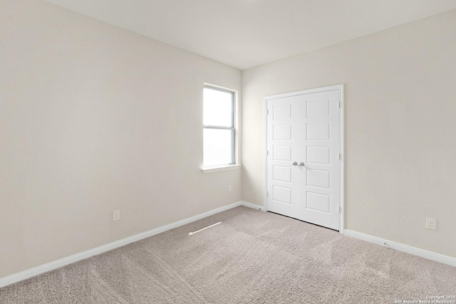 2614 Banditos Rdg, San Antonio, TX 78245 - unfurnished bedroom featuring carpet flooring and baseboards