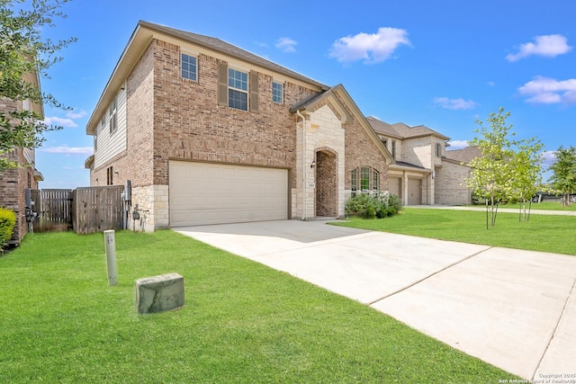 2614 Banditos Rdg, San Antonio, TX 78245 - view of front of property with concrete driveway, an attached garage, brick siding, and stone siding