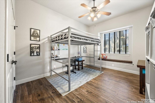 26815 Duet Dr, San Antonio, TX 78260 - bedroom featuring wood finished floors, a desk, and a ceiling fan