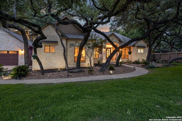 26815 Duet Dr, San Antonio, TX 78260 - view of front of property with stone siding, an attached garage, and stucco siding