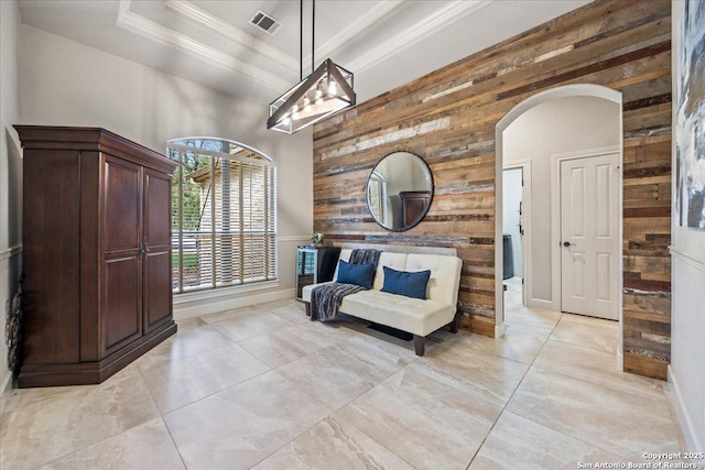 26815 Duet Dr, San Antonio, TX 78260 - sitting room featuring wood walls, crown molding, arched walkways, and a high ceiling