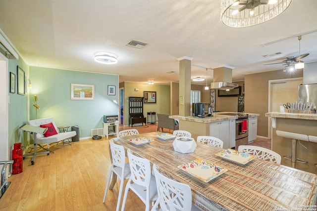 9518 Wahada, San Antonio, TX 78217 - dining space featuring ceiling fan and light wood-style flooring