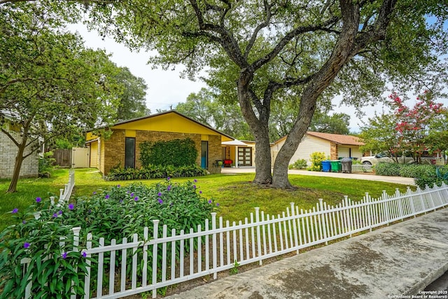 9518 Wahada, San Antonio, TX 78217 - view of front facade with brick siding and driveway