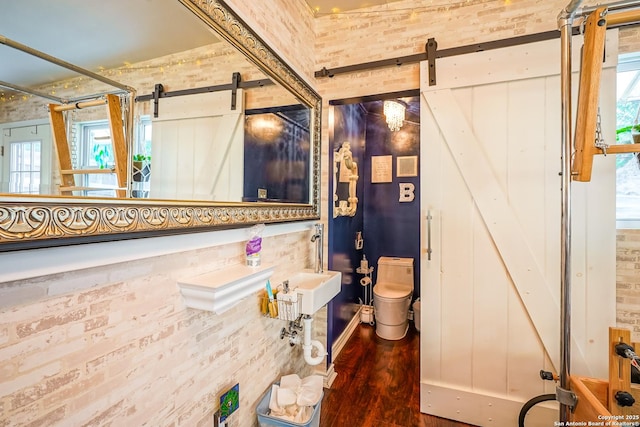 9518 Wahada, San Antonio, TX 78217 - bathroom with toilet and wood finished floors