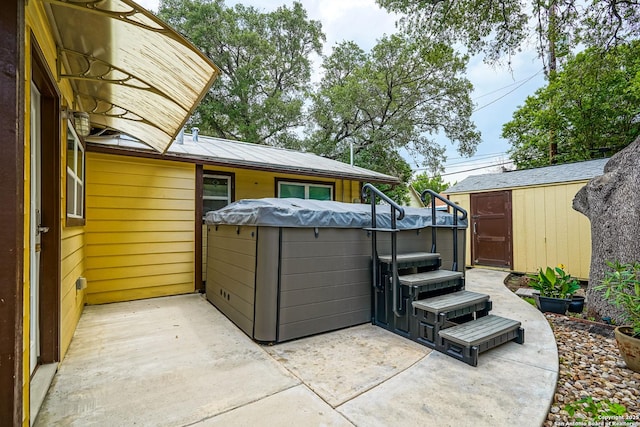 9518 Wahada, San Antonio, TX 78217 - view of patio with a storage unit and a hot tub