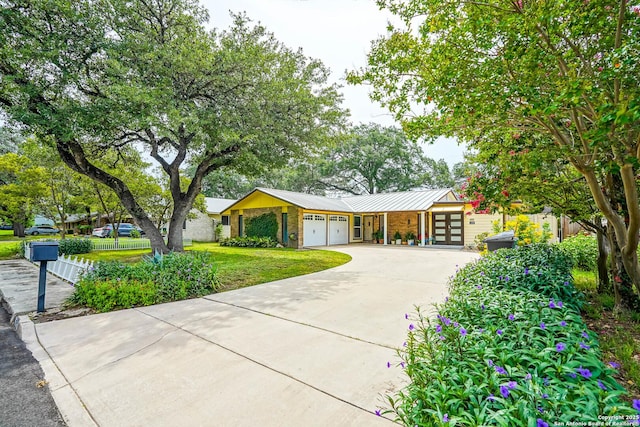 9518 Wahada, San Antonio, TX 78217 - mid-century inspired home with a garage, french doors, concrete driveway, and a metal roof