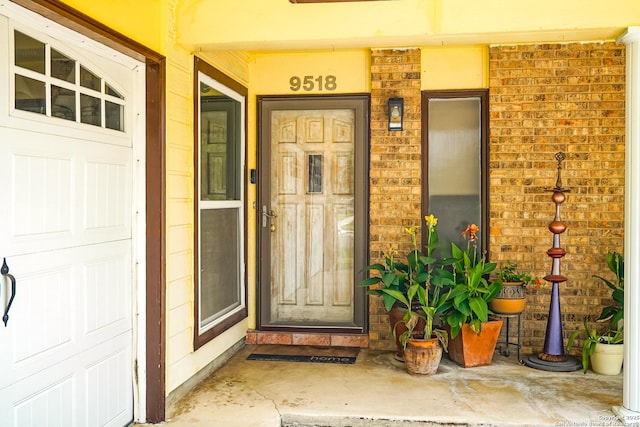 9518 Wahada, San Antonio, TX 78217 - doorway to property with covered porch and brick siding