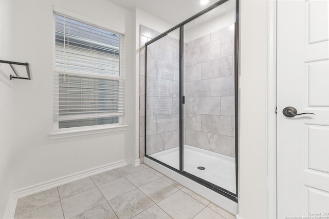 4557 Klein Mdws, New Braunfels, TX 78130 - bathroom with a shower stall and tile patterned floors