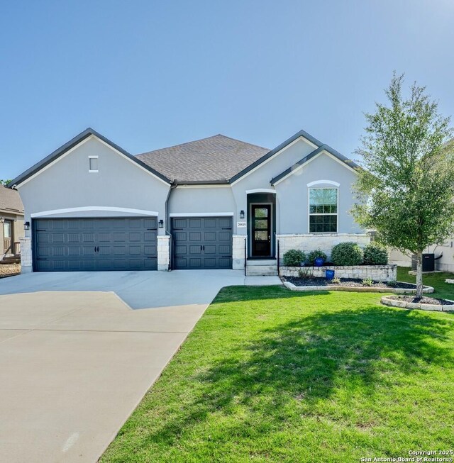 29519 Elkhorn, Fair Oaks Ranch, TX 78015 - ranch-style home featuring stucco siding, a garage, concrete driveway, and a front lawn