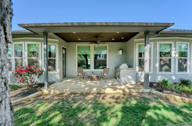29519 Elkhorn, Fair Oaks Ranch, TX 78015 - view of patio featuring an outdoor kitchen and a ceiling fan