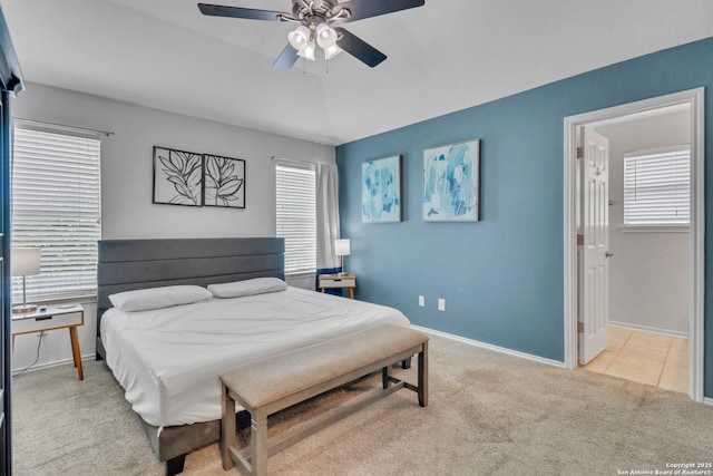 9427 Hacienda Acres, San Antonio, TX 78245 - carpeted bedroom with a ceiling fan and tile patterned floors