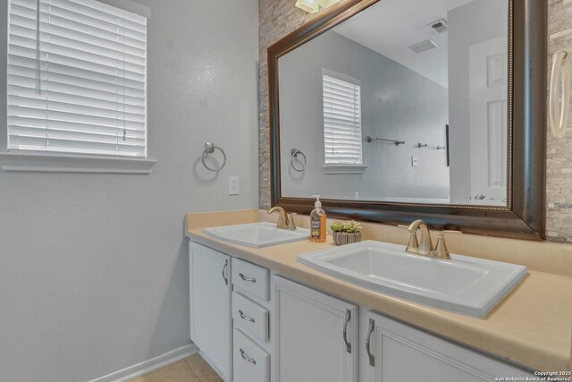 9427 Hacienda Acres, San Antonio, TX 78245 - bathroom featuring double vanity