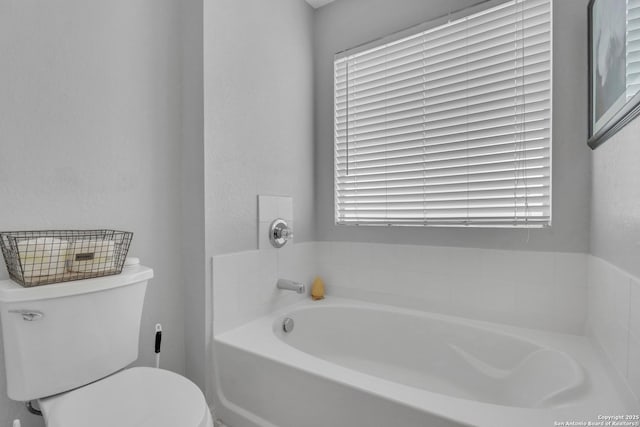 9427 Hacienda Acres, San Antonio, TX 78245 - full bathroom with a bath and toilet