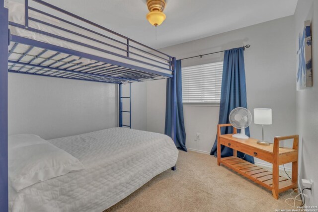 9427 Hacienda Acres, San Antonio, TX 78245 - bedroom with carpet and a ceiling fan