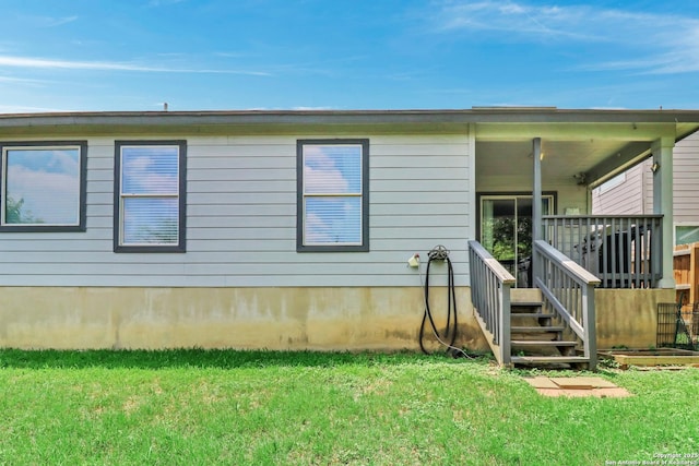 9427 Hacienda Acres, San Antonio, TX 78245 - back of property featuring a lawn