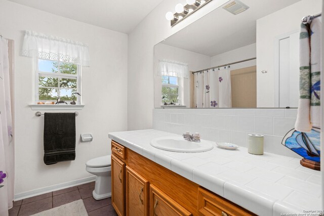 655 Shepherds, Bulverde, TX 78163 - bathroom featuring vanity, tasteful backsplash, tile patterned floors, and curtained shower
