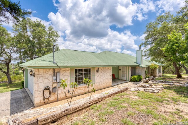 655 Shepherds, Bulverde, TX 78163 - ranch-style home featuring stone siding and a chimney