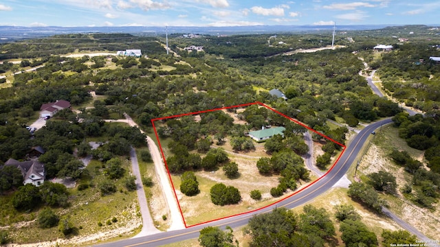 655 Shepherds, Bulverde, TX 78163 - aerial overview of property's location with property boundaries highlighted and a heavily wooded area