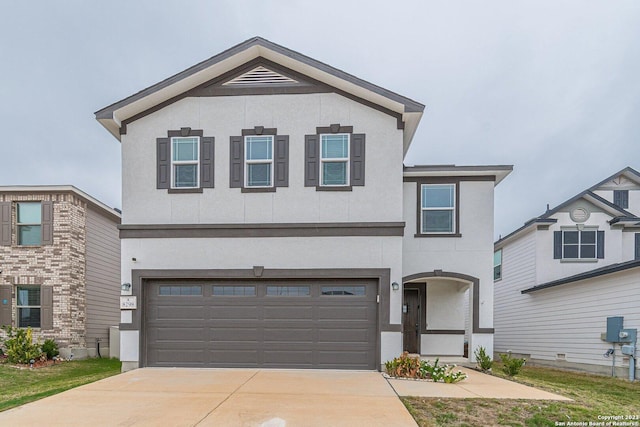 8298 Assumption Dr, San Antonio, TX 78254 - traditional-style house featuring a garage, driveway, and stucco siding
