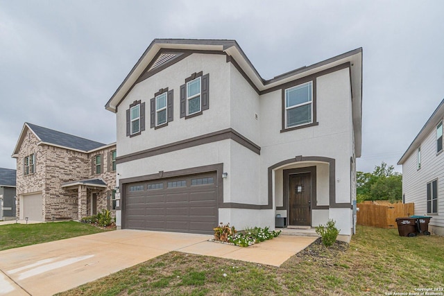 8298 Assumption Dr, San Antonio, TX 78254 - view of front facade with a garage, concrete driveway, stucco siding, and stone siding
