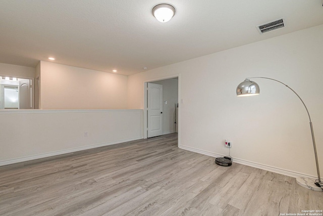 8298 Assumption Dr, San Antonio, TX 78254 - spare room featuring wood finished floors and recessed lighting