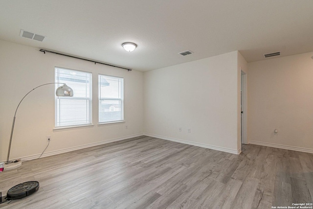 8298 Assumption Dr, San Antonio, TX 78254 - empty room featuring light wood finished floors and baseboards