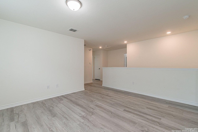 8298 Assumption Dr, San Antonio, TX 78254 - unfurnished room featuring light wood-style floors, recessed lighting, and a smoke detector