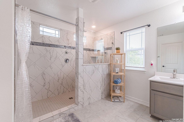 8298 Assumption Dr, San Antonio, TX 78254 - bathroom featuring healthy amount of natural light, walk in shower, and tile patterned floors