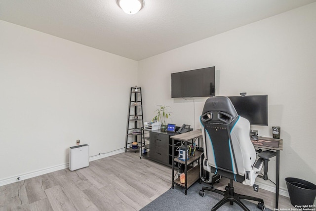 8298 Assumption Dr, San Antonio, TX 78254 - office area featuring wood finished floors and baseboards