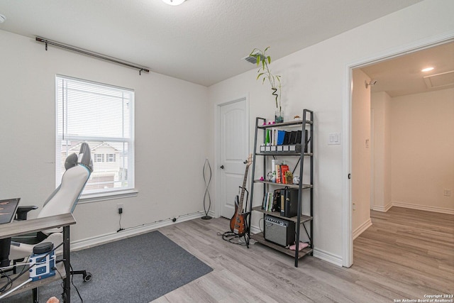8298 Assumption Dr, San Antonio, TX 78254 - office featuring light wood-type flooring and baseboards